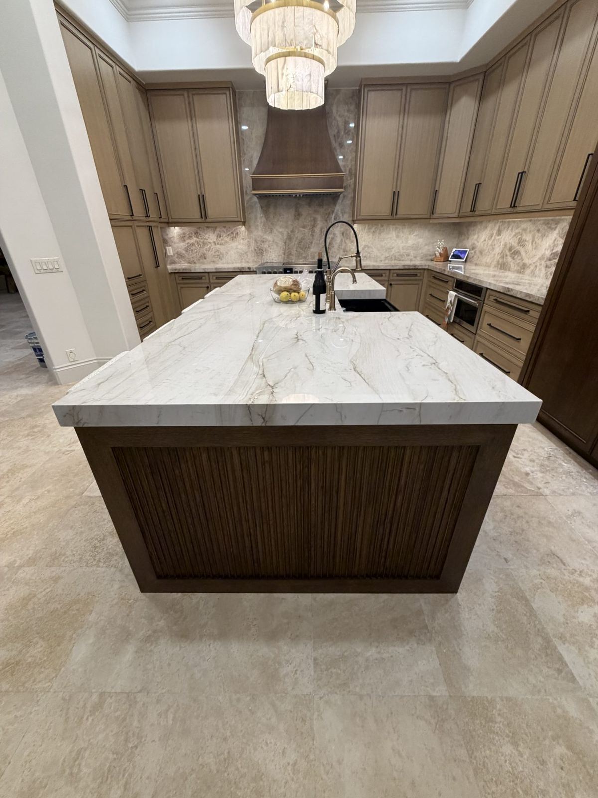 Remodeled kitchen with custom wood island and quartzite top